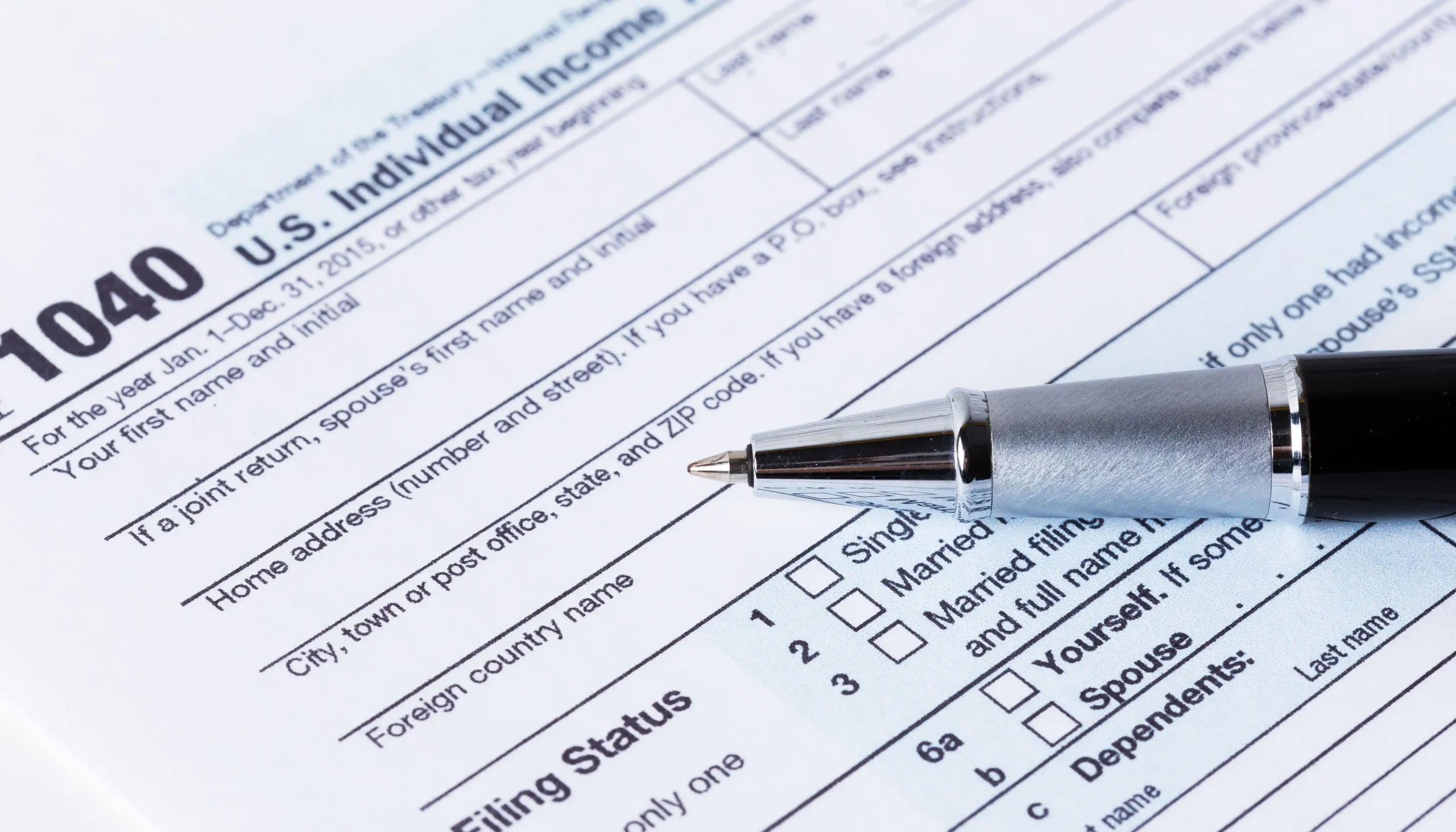 income-tax-form-and-pen-2025-02-25-10-34-03-utc_11zon